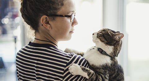 A girl holding her cat animal theme, 18-20 years old, togetherness, girl